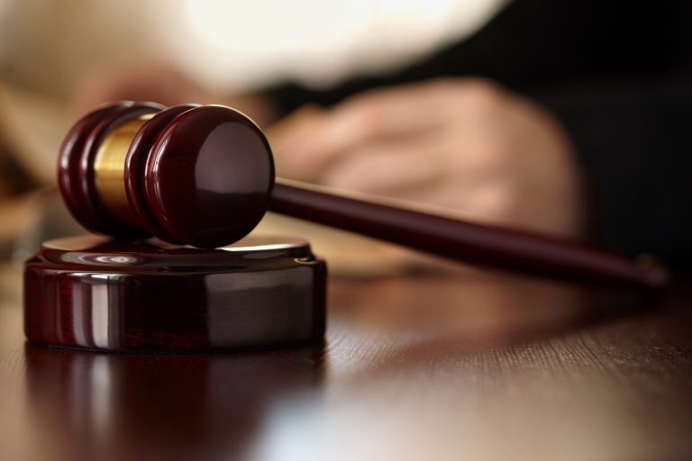 wood gavel with gold band